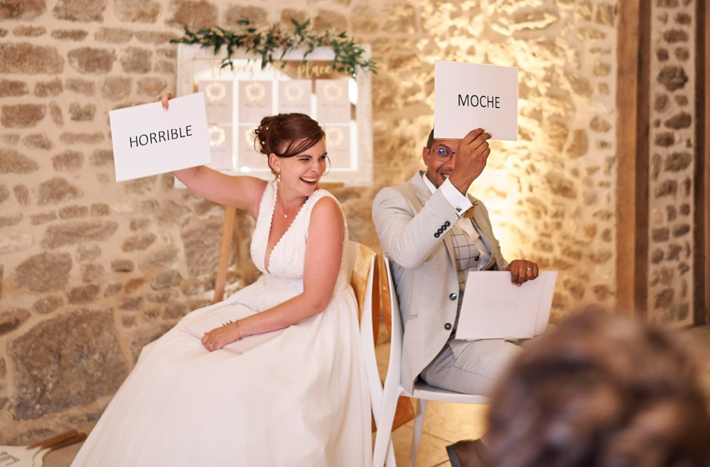 Jeu Elle et Lui pendant un mariage avec les mariés répondant à des questions humoristiques lors d'une animation proposée par LoL Événements.